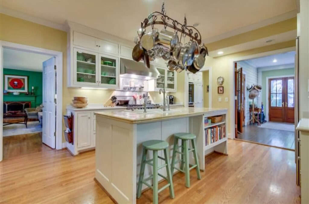 A before picture of the kitchen with an outdated look.